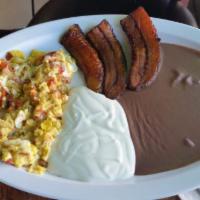 2 Eggs with Sweet Plantain, Bacon and Beans · Ripened banana. 
