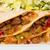 Grilled Steak Quesadilla · Cheese, salad, pico de gallo and crema.