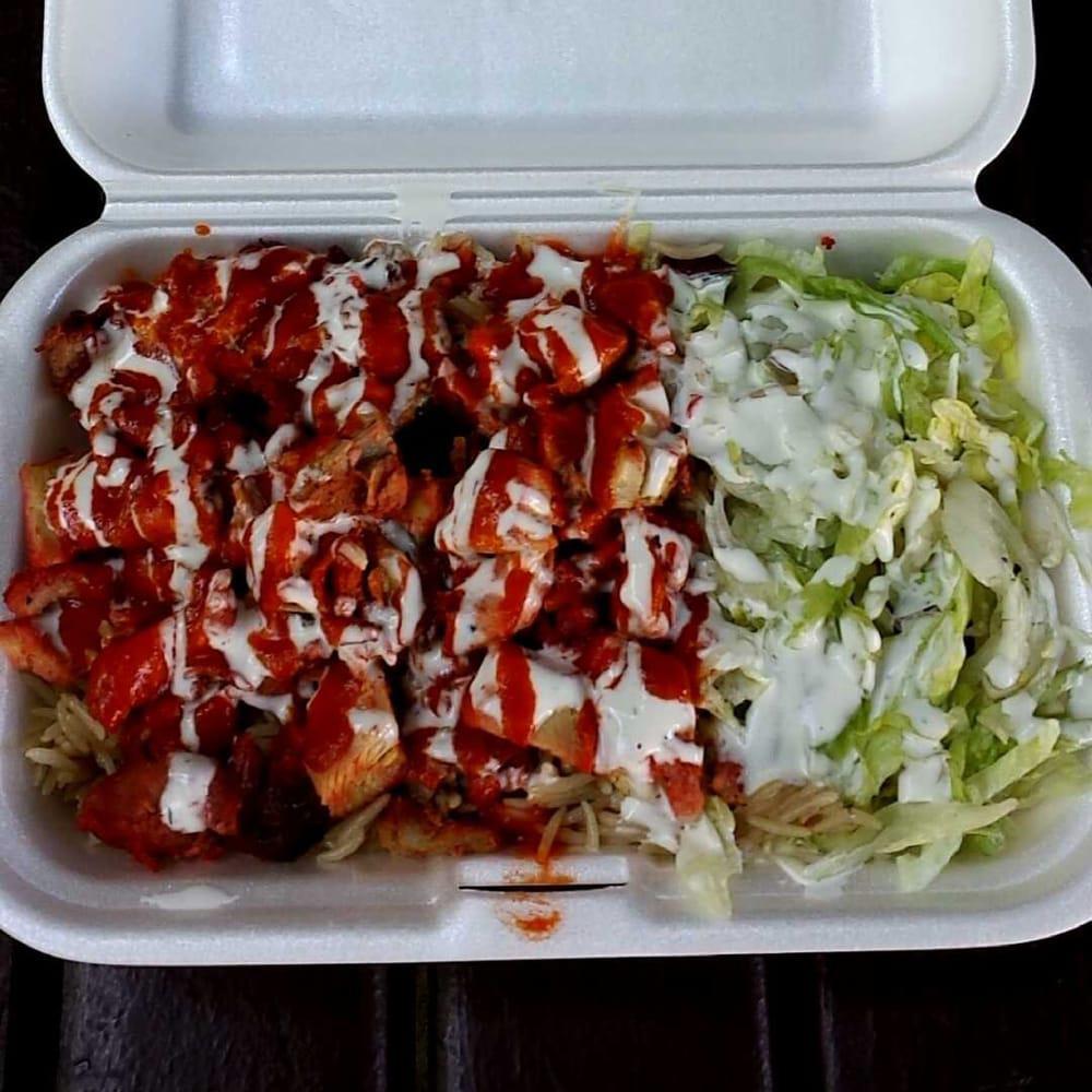 Lamb Over Rice Platter · Lamb over rice with Lettuce ,Tomatoes ,White Sauce