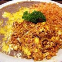Huevos con Chorizo · Eggs, chorizo with tortilla on the side. Served with rice and beans.