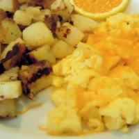 2 Eggs and Cheese · 
Home fries. Or French fries.toast bread 