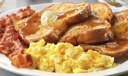 French Toast · Served with 2 eggs any style and choice of breakfast meat.