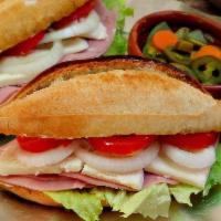 Ham and Cheese Torta · Beans, lettuce, tomatoes, avocado, jalapeno, chipotle mayo and cheese.