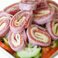 Chef Salad · Iceberg lettuce, tomato, onion, black olives, green pepper, ham, pepperoni, turkey and cheese.