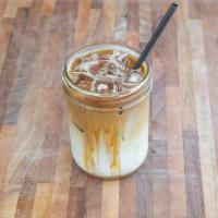 Iced Caramel Macchiato · Our freshly brewed medium roast espresso mixed caramel syrup and steamed milk with a small l...