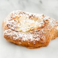 Almond Pain au Chocolat · A chocolate croissant sliced in half filled with almond cream (frangipane and pastry cream)....