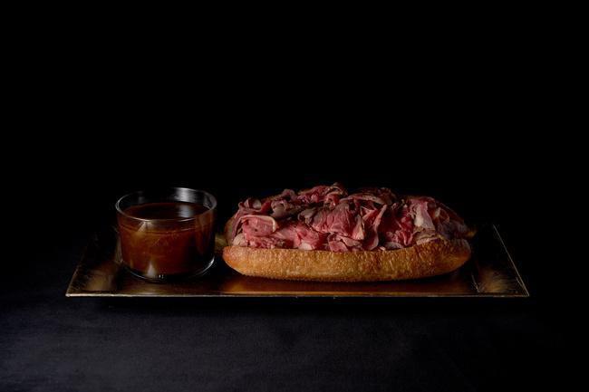 Classic French Dip - · Porcini Rubbed Roast Beef, Horseradish Cream, and Red wine Au Jus. Comes with Kettle Chips.