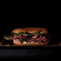 Roast Beef Sandwich - · Porcini Rubbed Roast Beef, Havarti, Mushroom-Onion Jam, Horseradish Aioli, Arugula. Comes wi...