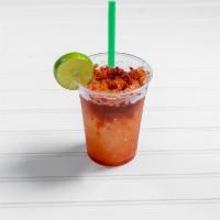 Perro Salado · Mineral water, lemon, chamoy, chile powder, ice shaved and salt.
