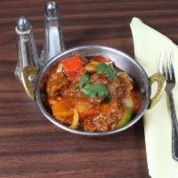 Kadai Lamb* · Delicately spiced chunks of lamb cooked in an Indian wok with herbs and spices.