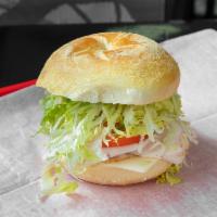 6. Turkey Sandwich · Served with creamy baby Swiss, lettuce, tomatoes and horseradish sauce.