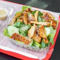 Chicken Caesar Salad · Green salad with Caesar dressing and cheese. 