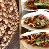 Chipotle Chicken Tacos · Pulled Chipotle Chicken Tacos with Homemade Guacamole and Pico de Gallo and Cilantro 