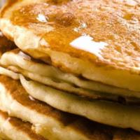 3 Buttermilk Pancakes · Served with real butter and 100% natural syrup.