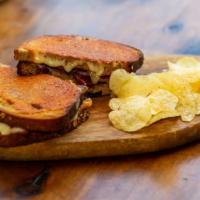 Pastrami Melt Sandwich · Boar's Head brisket pastrami, pepper Jack cheese, gourmaise sauce, honey mustard and brussel...