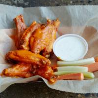 Korean BBQ Style Wings · Cucumber salad, carrot and celery.