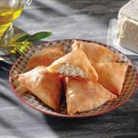 4 Piece Mini Cheese Pie · Tyropites. Traditional Greek feta cheese pie.