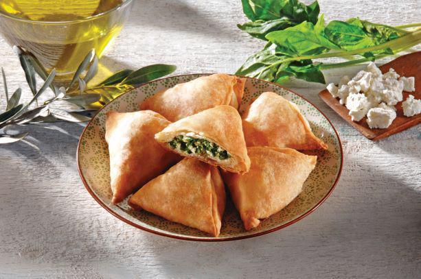 Mini Spanakopites · Traditional Greek spinach and feta pies.