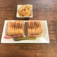 The Classic Panini · Ham, bacon, cheddar cheese, tomatoes, onions and mayonnaise (show on classic ciabatta bread).
