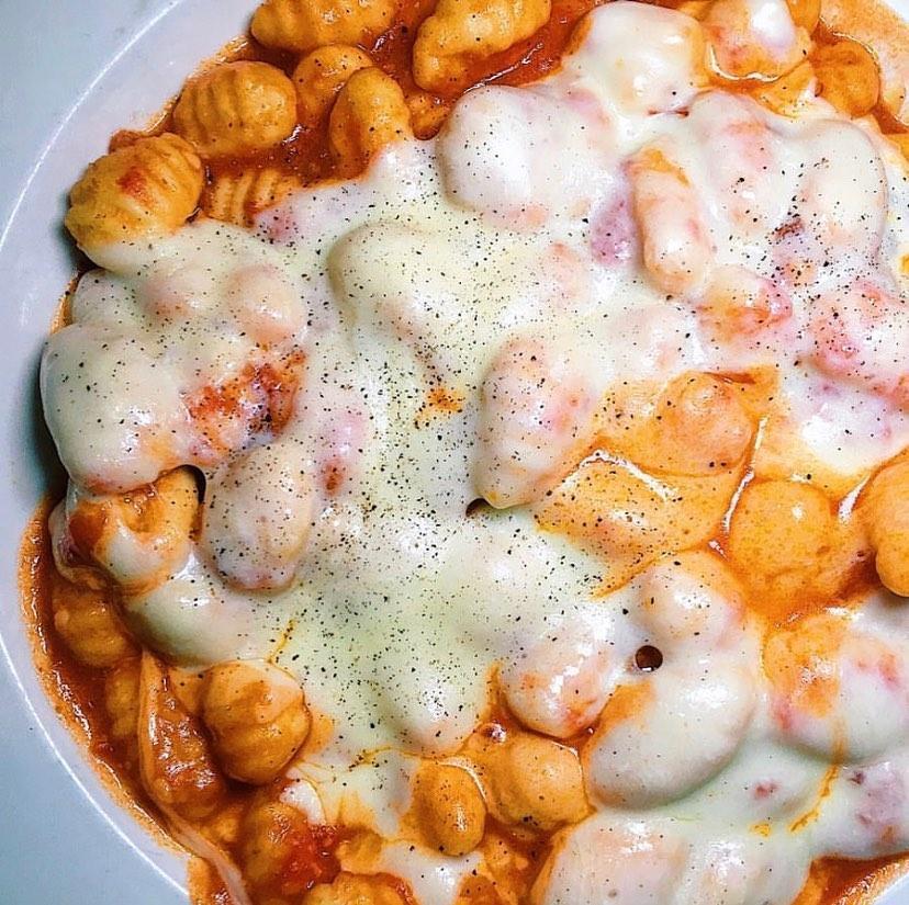 Gnocchi Sorrentino · Potato filled pasta with tomato and melted mozzarella.