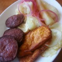 Yucca Breakfast/ tres golpes with Yucca · Yuca, salami, cheese and eggs any style