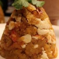 Cheese mofongo/ Mofongo de Queso · Cheese mofongo, mashed plantains and a house gravy