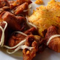 Mofongo de Chicharron/fried pork · Chicharron, mashed plantains and a house gravy
