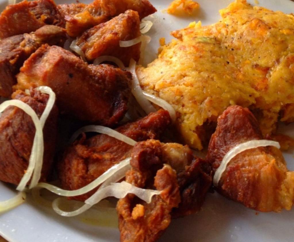 Mofongo de Chicharron/fried pork · Chicharron, mashed plantains and a house gravy