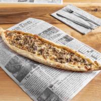 Roasted Pulled Lamb Pide · Delicious roasted pulled lamb meat and shredded mozzarella cheese.