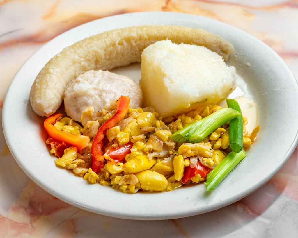 Ackee and Saltfish Breakfast · Stir fried Ackee, tomato, red pepper, green pepper and onion lightly seasoned and simmered down with codfish.
