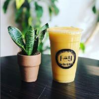 Tropical Breeze Smoothie · Mango, peach and pineapple.