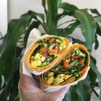 Veggie Delight Wrap · Avocado, onions, roasted peppers, spinach, carrot on a spinach herb wrap.