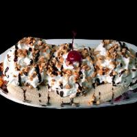 Banana Split · Classic: Comes with a scoop of Strawberry, Vanilla, and Chocolate topped with strawberry top...