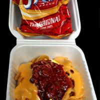Frito Pie · Frito chips with (no meat) chili and cheese. Please indicate if you want jalapenos on it! 