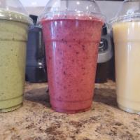 Berrylicious Smoothie · Strawberries, blueberries, raspberries and bananas blended with white grape peach juice.