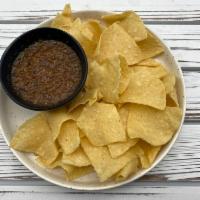 Chips and Salsa · Chips and roasted tomato salsa. 
