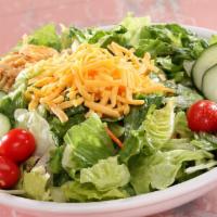 Garden Salad · Mixed greens, red cabbage, shredded carrots, cucumbers, cherry tomatoes, shredded cheese and...