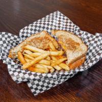 Patty Melt Sandwich · 2 fresh slices of wheat berry bread loaded with Swiss and American cheese and sauteed onions.

