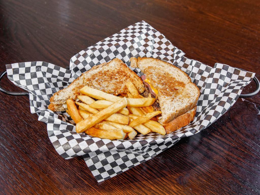 Patty Melt Sandwich · 2 fresh slices of wheat berry bread loaded with Swiss and American cheese and sauteed onions.
