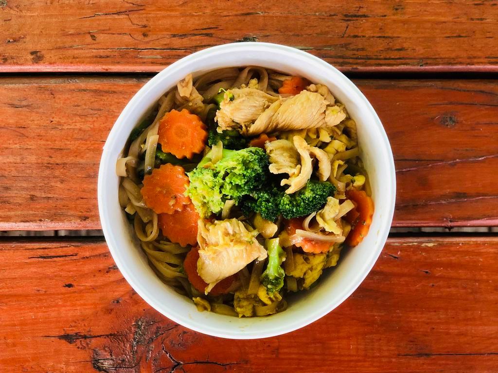 11. Pad Si Ew Kai · Stir-fried noodle in dark sweet soy sauce with chicken, egg, broccoli, and carrots.