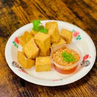 05. Age Tofu · Crispy fried tofu, served with sweet chili sauce.   
