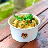 Green Kai Bulgogi  · Stir fly green curry paste with coconut milk, peas, carrot, and sweet basil. Choice of chick...