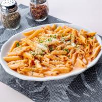 Alla Vodka Pasta · Pink sauce with cream and vodka. Served with a small house salad and warm bread. Choose cava...