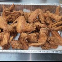 100 Jumbo Wings · 100 Golden Jumbo Chicken wings served with fries, mild sauce, and coleslaw.