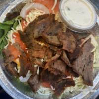 Gyro Salad · Salad with lettuce, tomato, onions,cheese,tzki sauce, and a slice of pita bread.