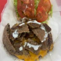 Gyro cheeseburger  · Gyro meat served on top of a delicious beef burger, with lettuce, cheese, tomato, and gyro s...