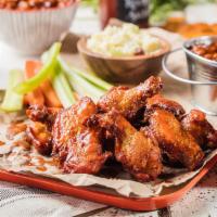 Traditional Wings · Seasoned and tossed in your choice of sauce. Served with choice of 2 sides and a  Corn Bread...