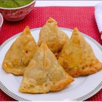 Samosa (Each) · Fried pastry with a savoury filling, such as spiced potatoes and peas. Goes with red and gre...