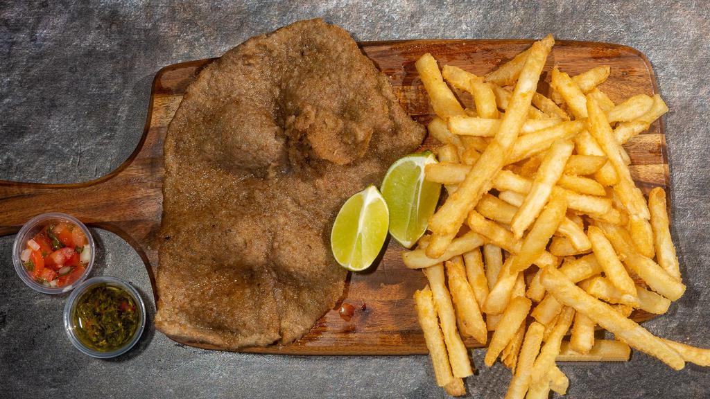 Country Fried Steak (Argentinian Style) with one Side · Milanesa de carne y un acompanante.