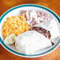 Burrito Dinner · 1 steak burrito. Served with rice and beans on the side.